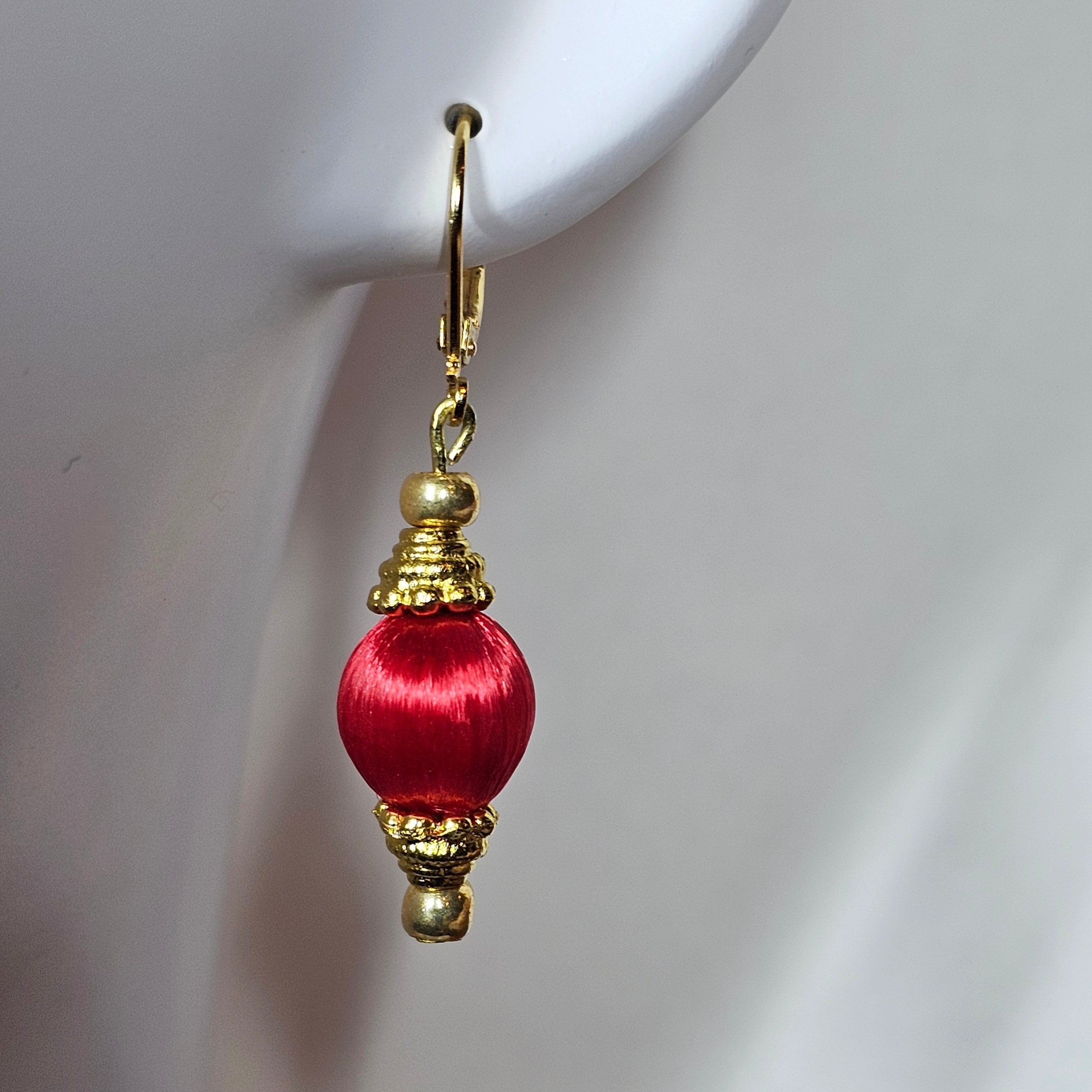 Red vintage and repuposed earrings