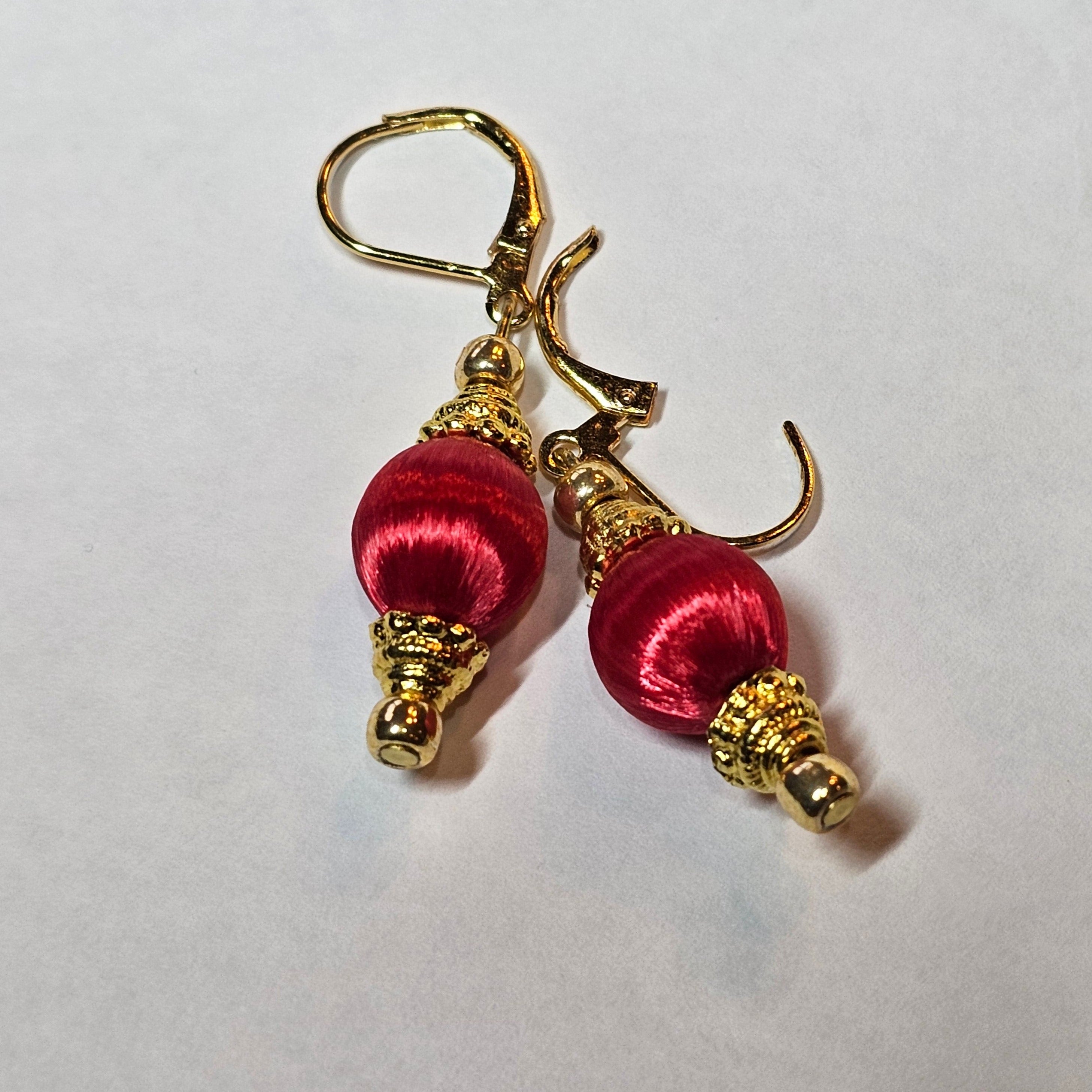 Red vintage and repuposed earrings